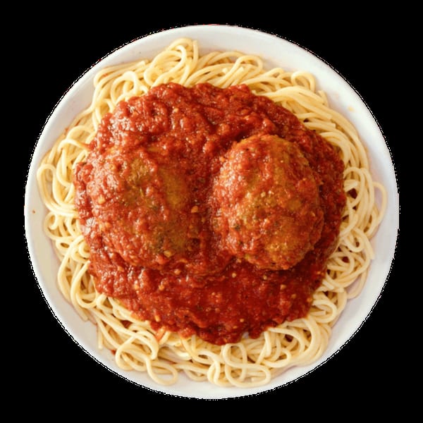 Spaghetti and meatballs with rich red marinara sauce in a white bowl, viewed from above.