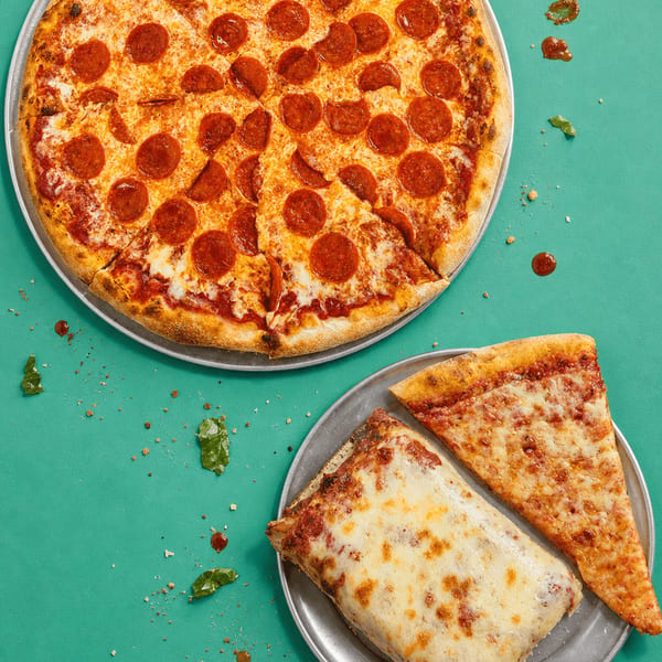 New York thin fold beside a thick square Sicilian slice